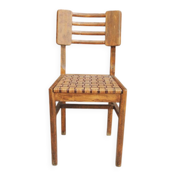 Old wooden chair in the style of Pierre Cruège.