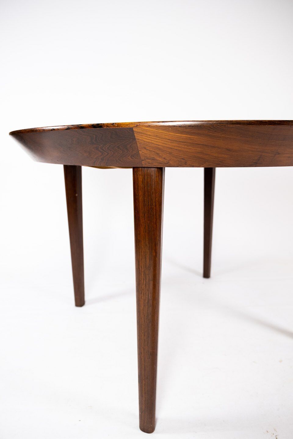 Dining table in rosewood of danish design from the 1960s.