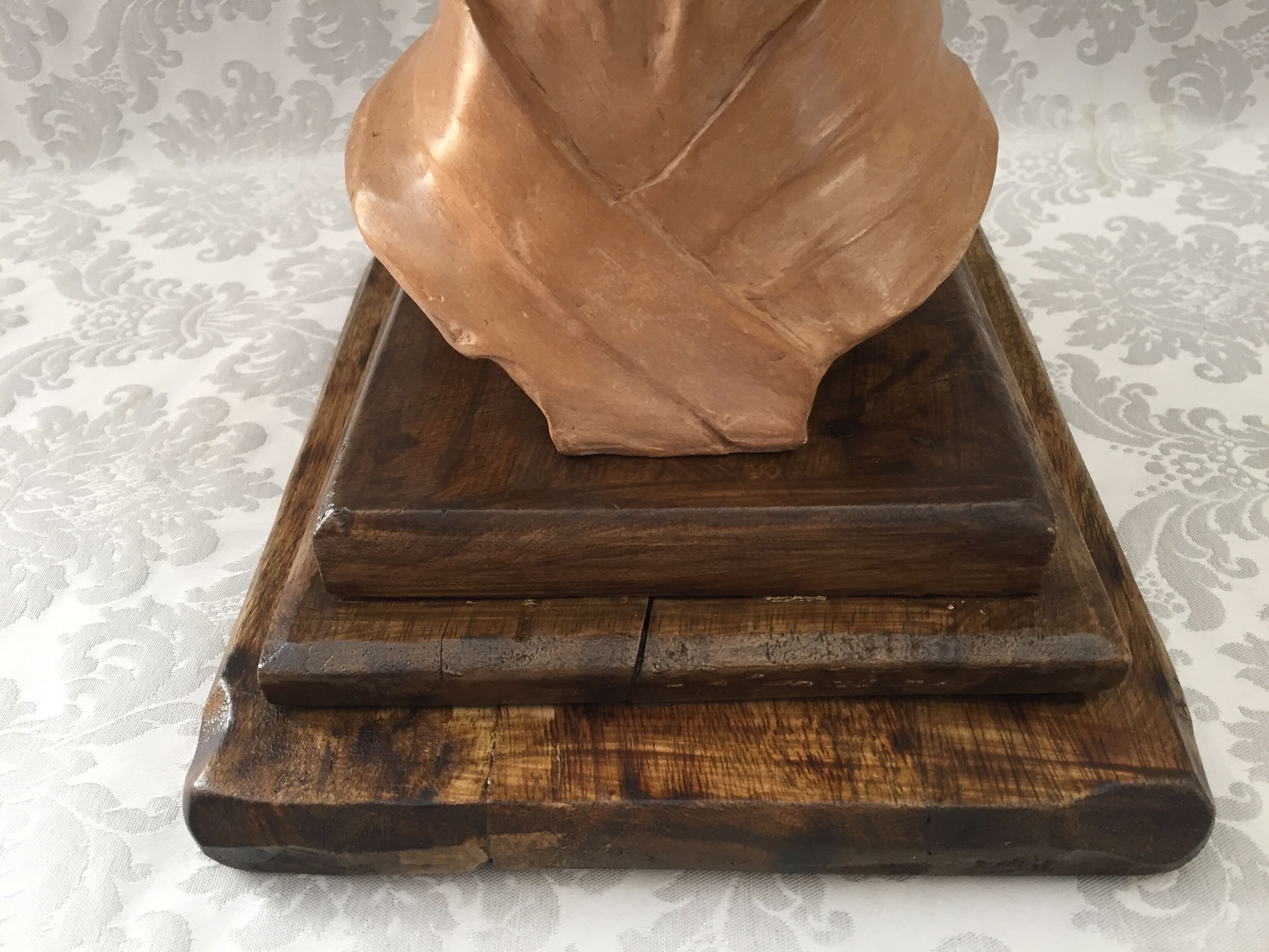 Bust in raw earth of atelier bust face of woman signed j.c.g.