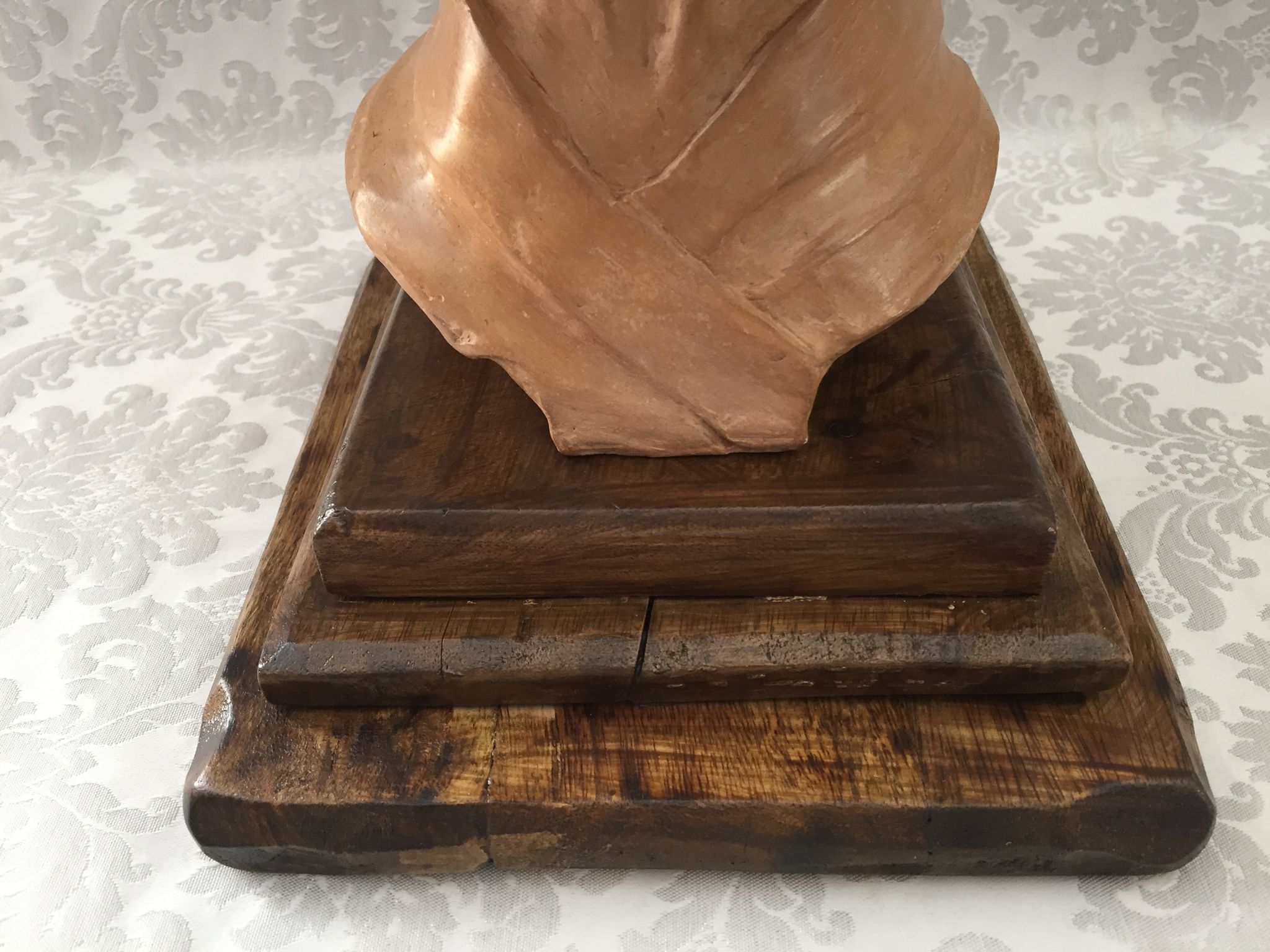 Bust in raw earth of atelier bust face of woman signed j.c.g.