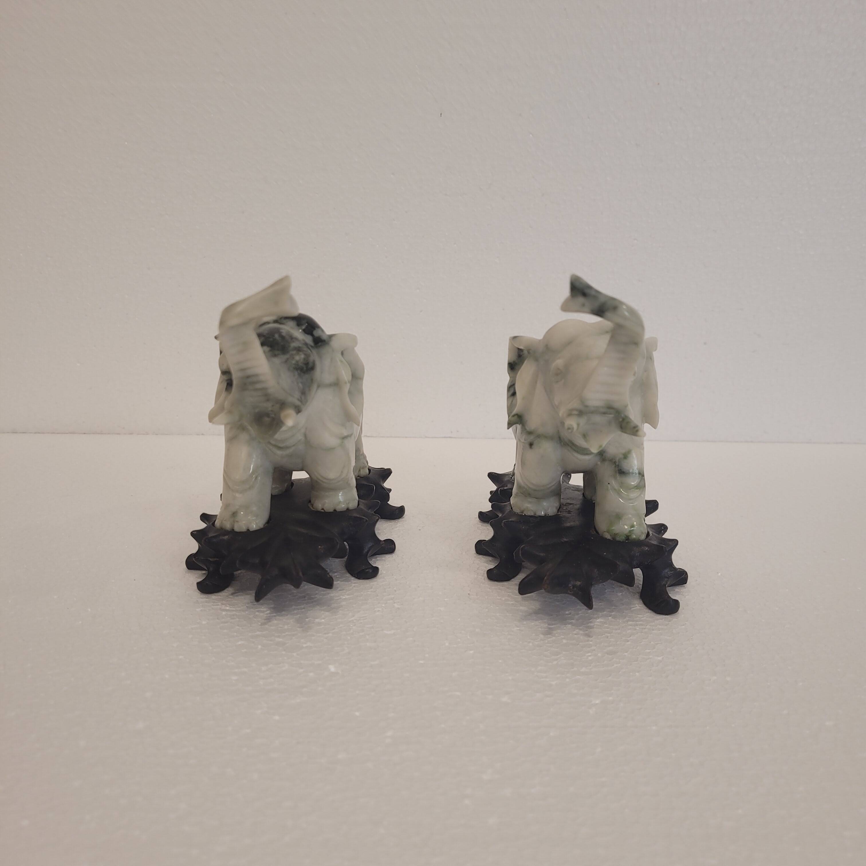 Pair of elephant paperweights, veined marble, 80s - France