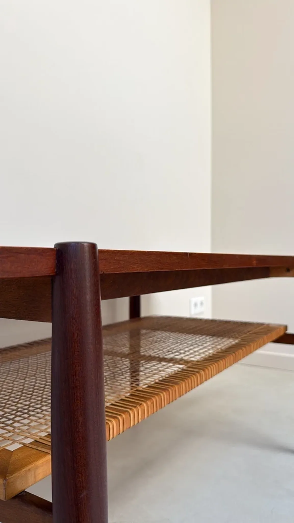 Vintage wooden coffee table with wicker lower shelf