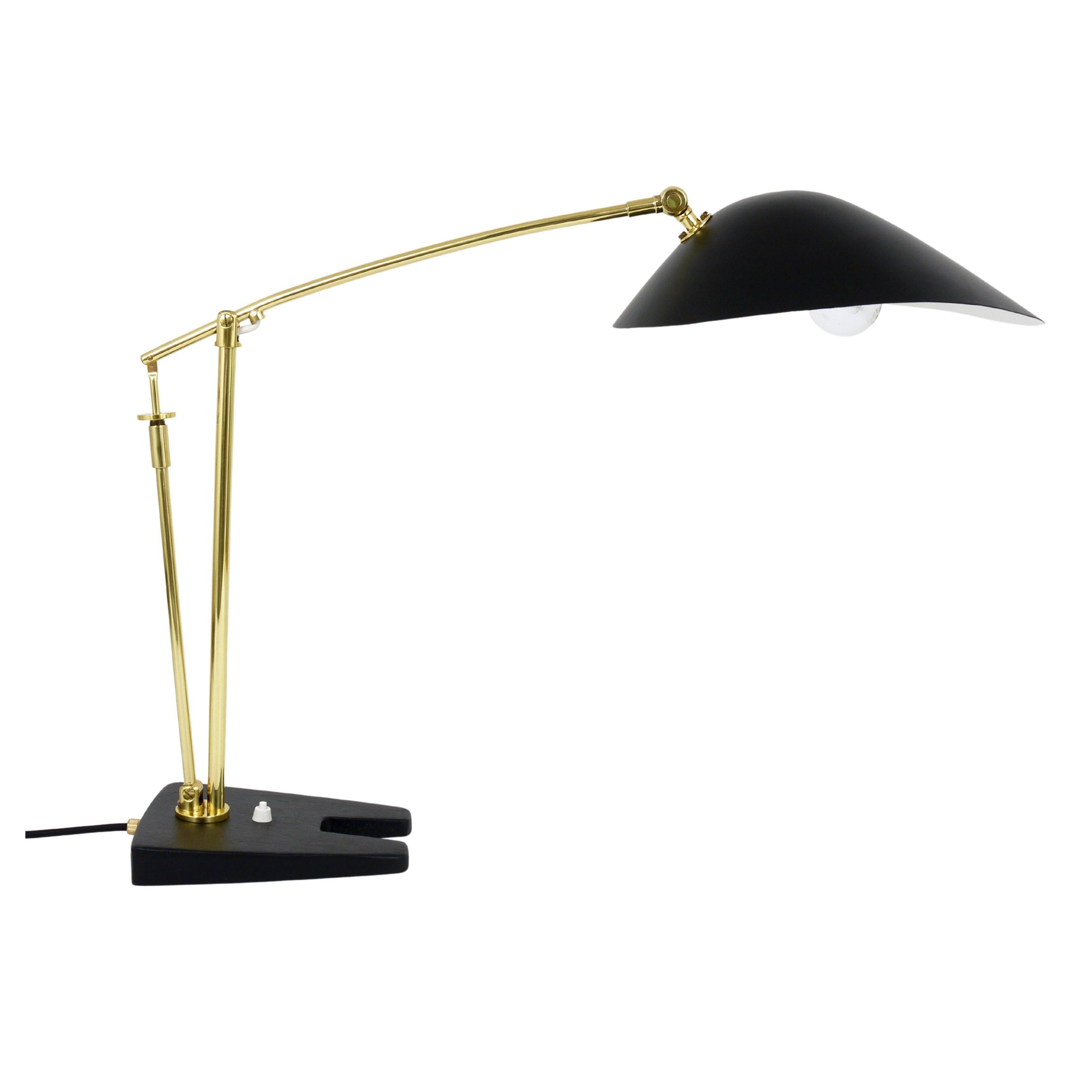 Articulated brass desk lamp in the style of Angelo Lelli, mid-century, Italy, 1950s.