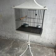 Mid-century pagoda bird cage on stand — white & black metal with brass accents