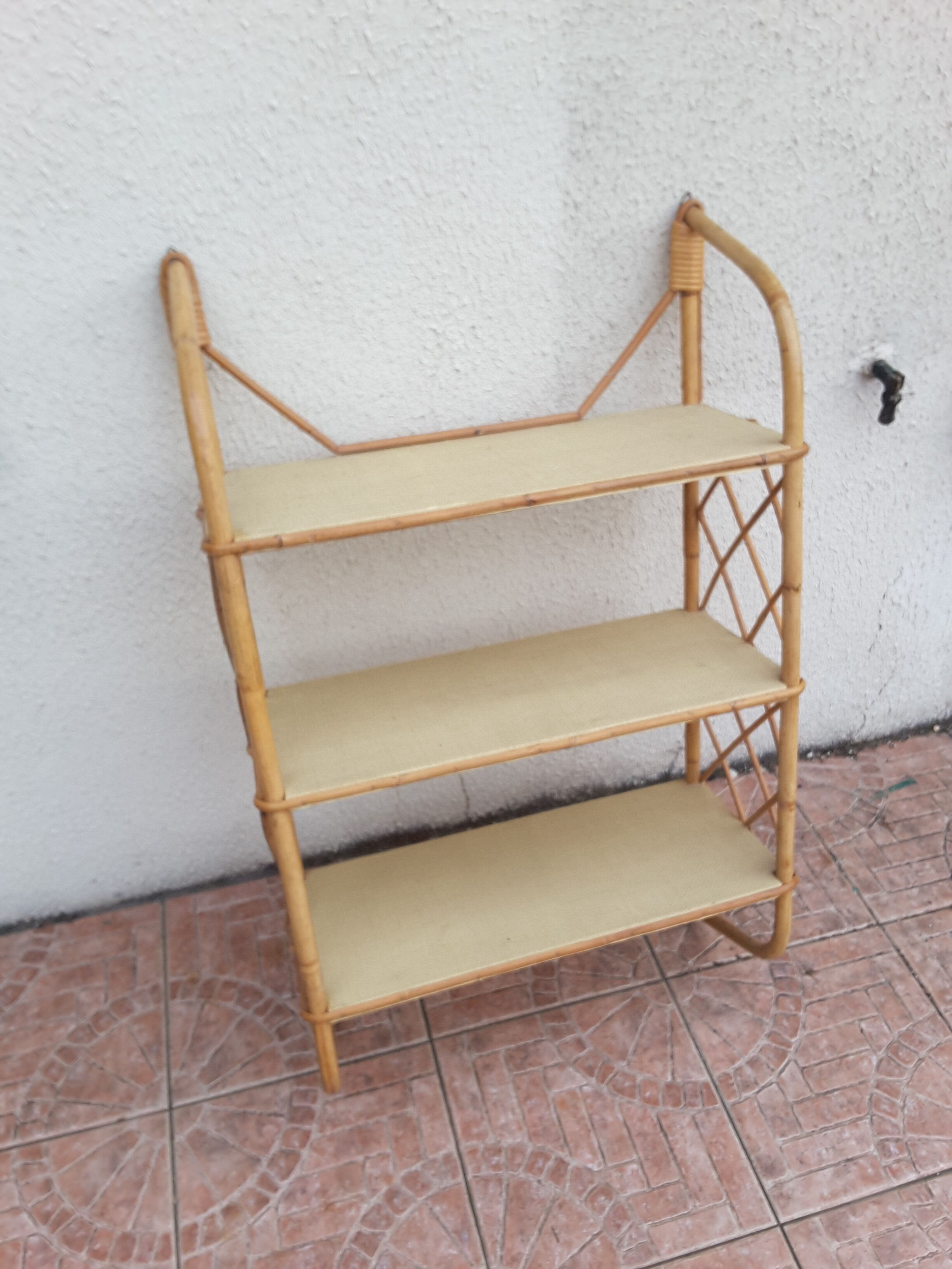 Rattan wall shelf