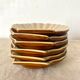 Beige and caramel ceramic scallops