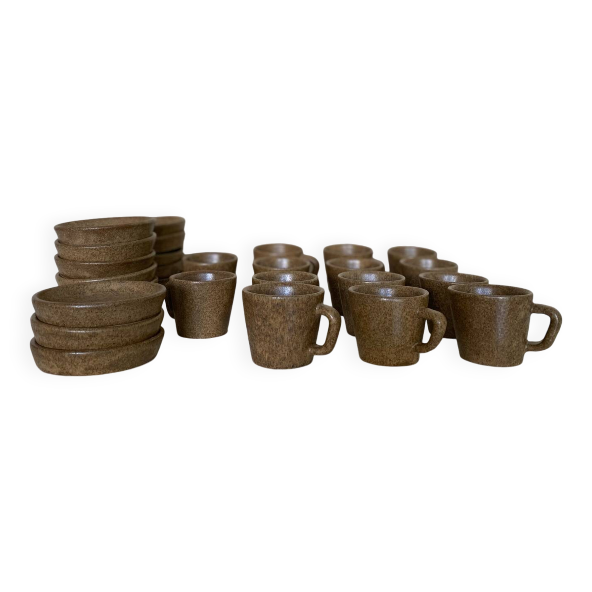 Set of stoneware coffee cups with saucers