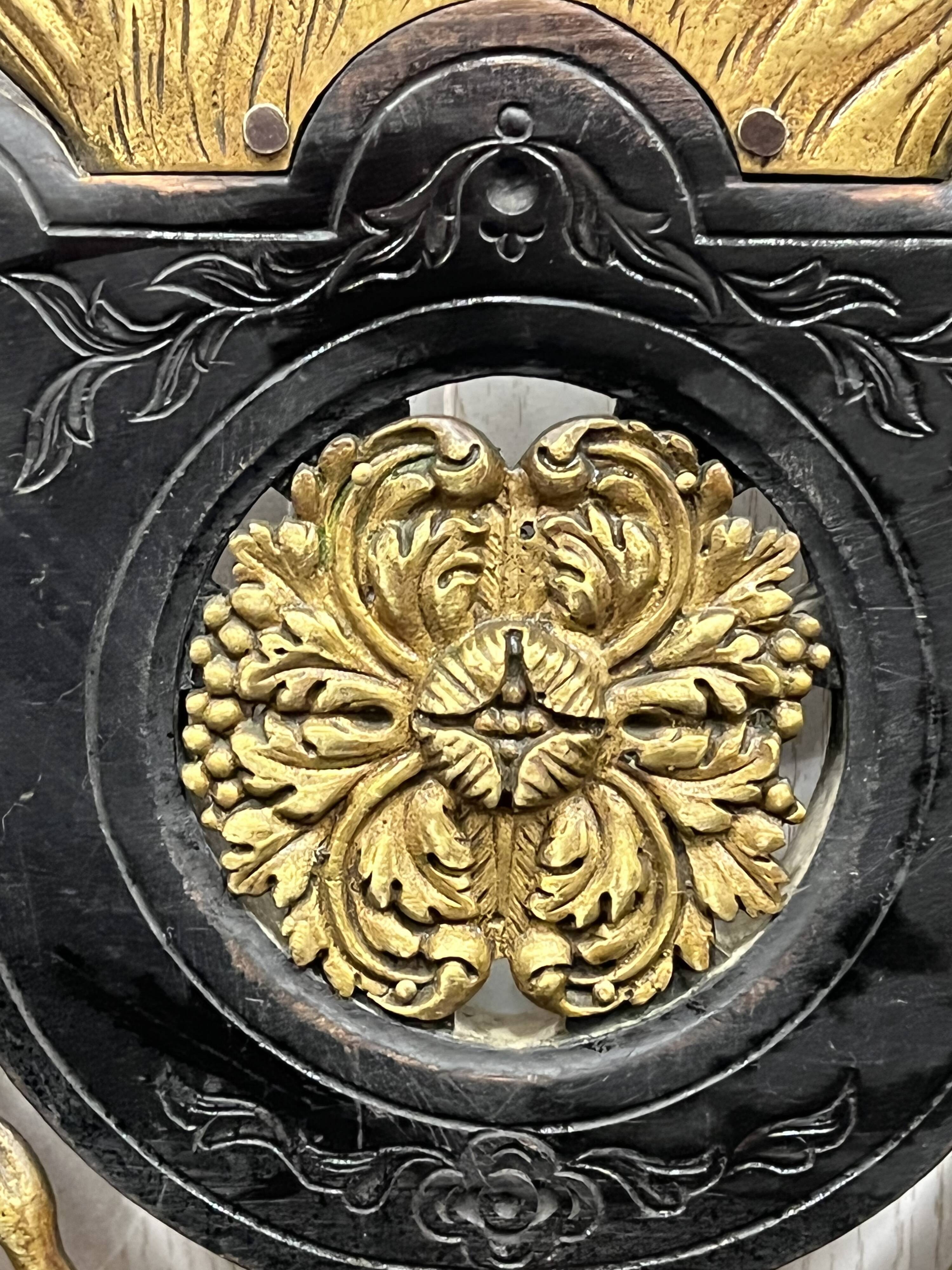 Blackened wooden shelf.