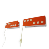 Pair of Scandinavian wall sconces with swivel shade in orange metal. 70