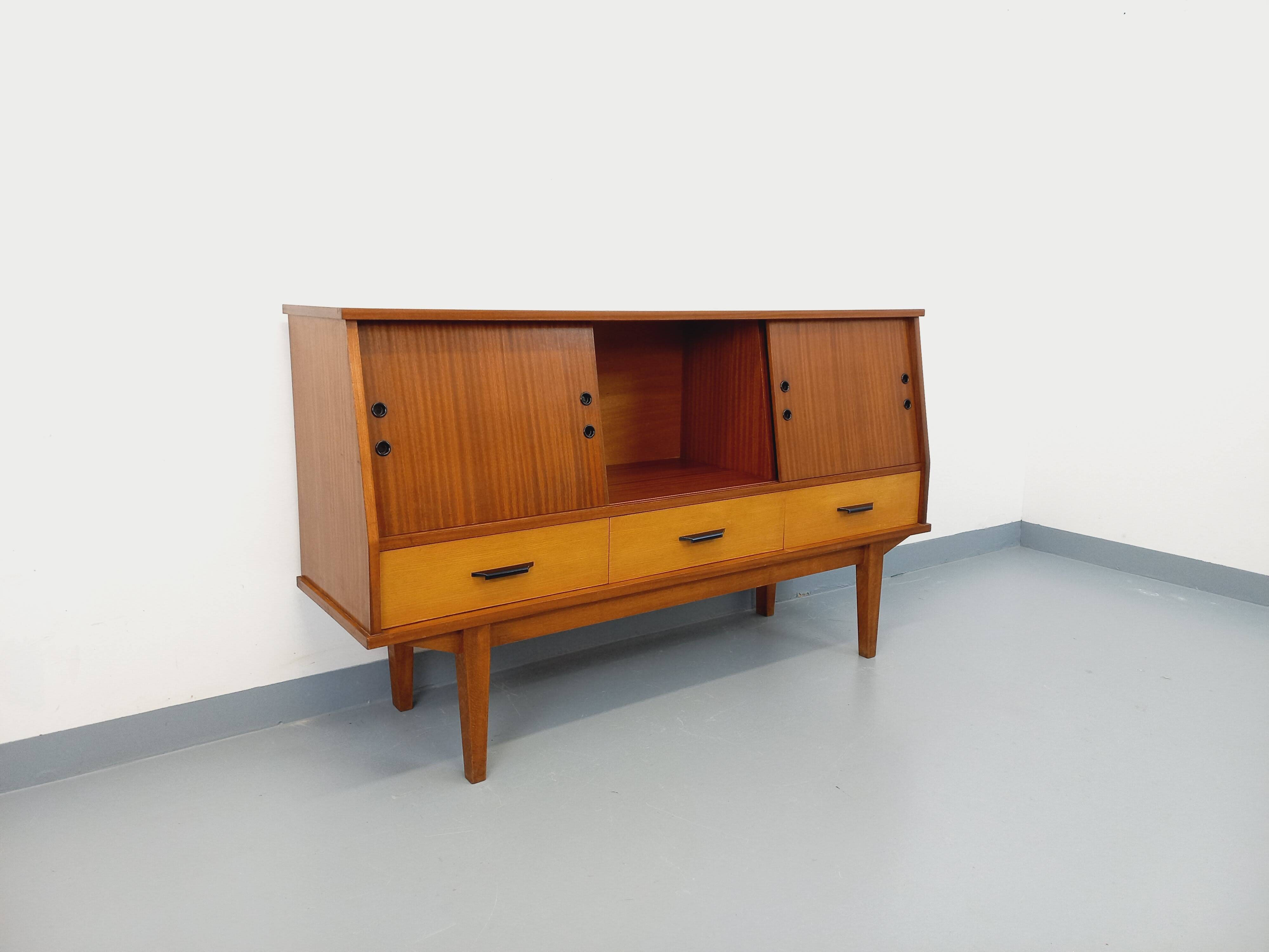 Vintage wooden enfilade in teak style from the 1960s.