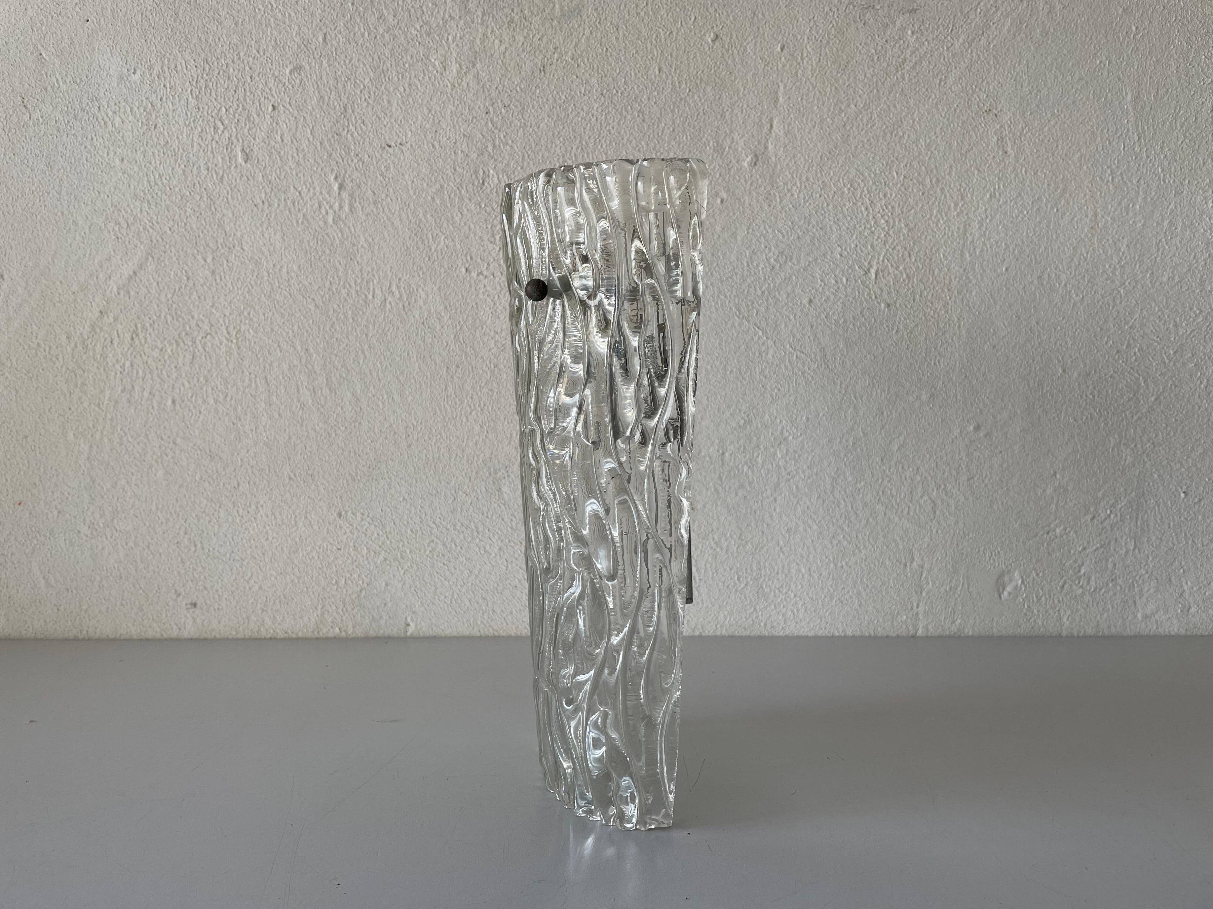 Simple arch-shaped wall light in textured glass, 1950s, Germany.