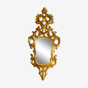 Carved and gilded wooden mirror with gold leaf 46 x 103 cm