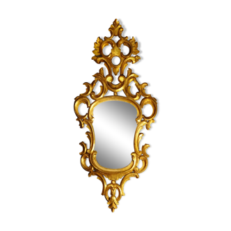 Carved and gilded wooden mirror with gold leaf 46 x 103 cm