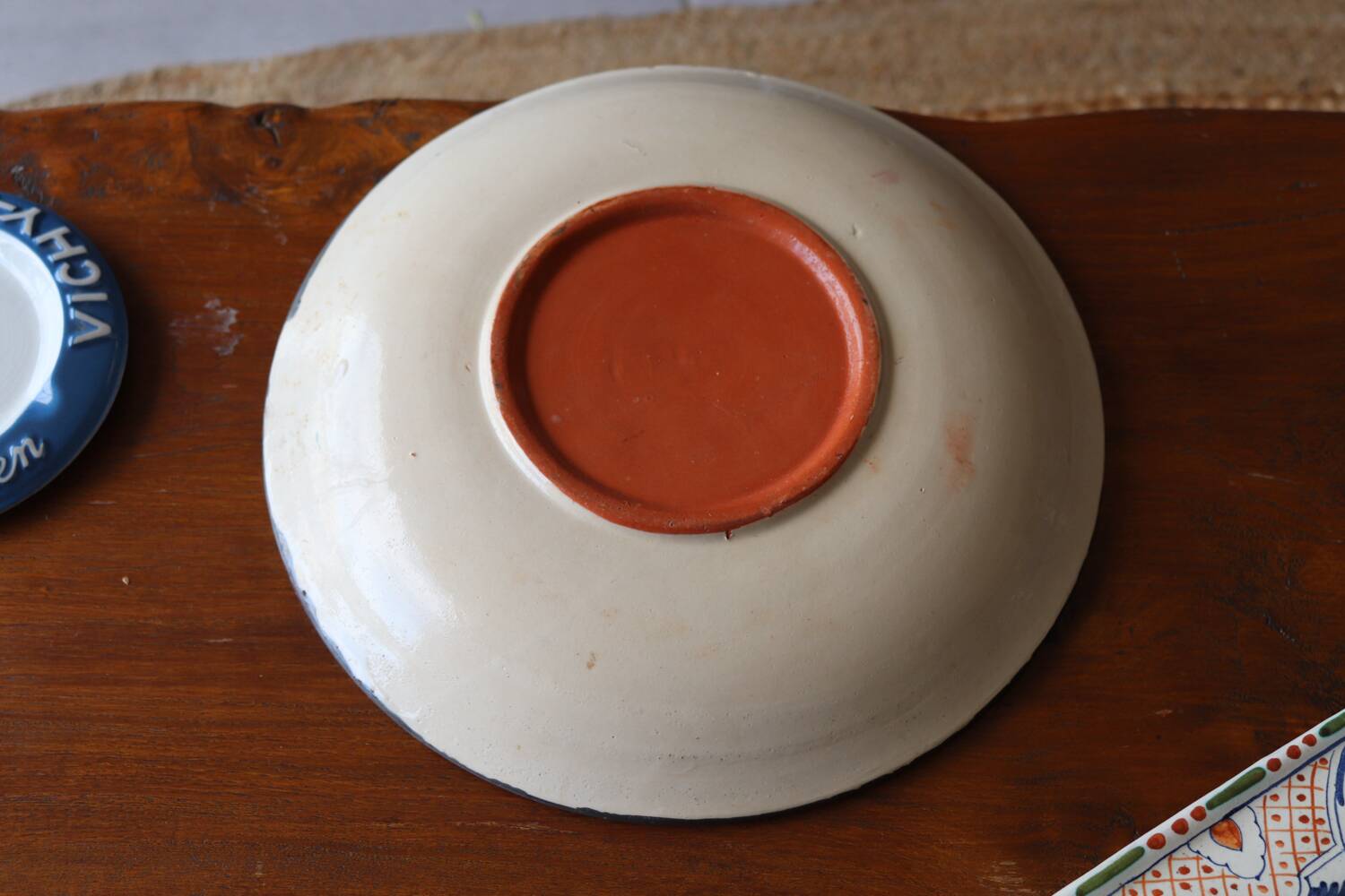 Glazed earthenware dish – polychrome floral decoration