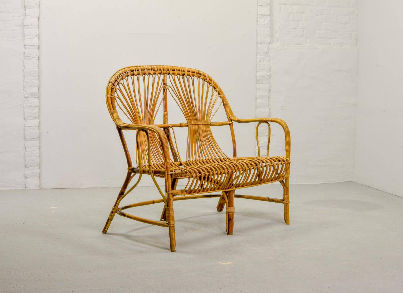 Elegant Rohé Style Vintage Design Rattan Bamboo Two-Seat Patio Sofa, 1950s.