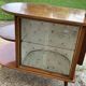 Art Deco brown walnut cocktail bar cabinet with integrated lamp and mirrored display 1950s