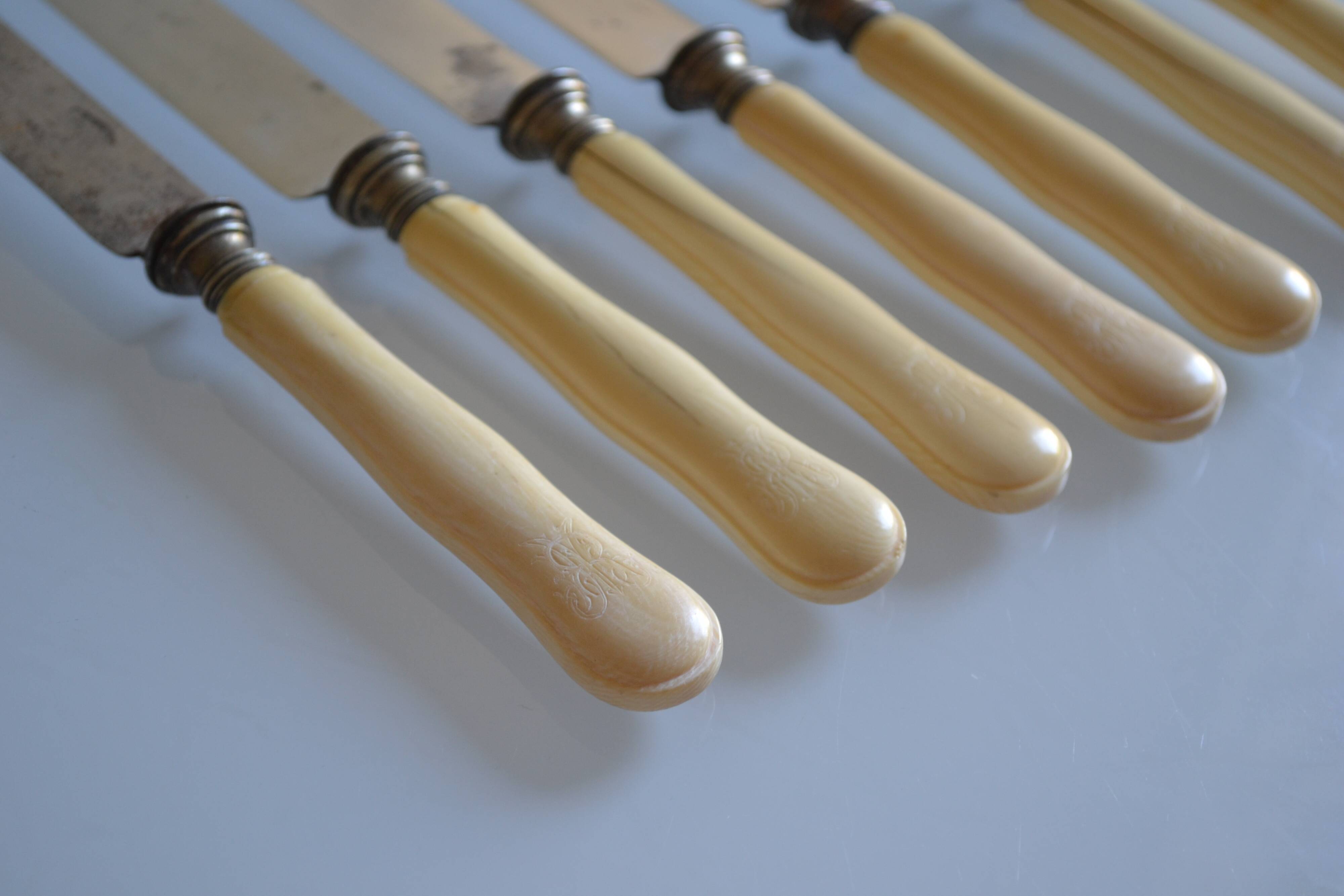 7 old table knives from the 19th century, monogrammed ivory-colored handles