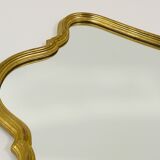 Curved wall mirror in gilded wood Chelini Firenze, mid-century, Italy, 1950s.
