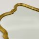 Curved wall mirror in gilded wood Chelini Firenze, mid-century, Italy, 1950s.