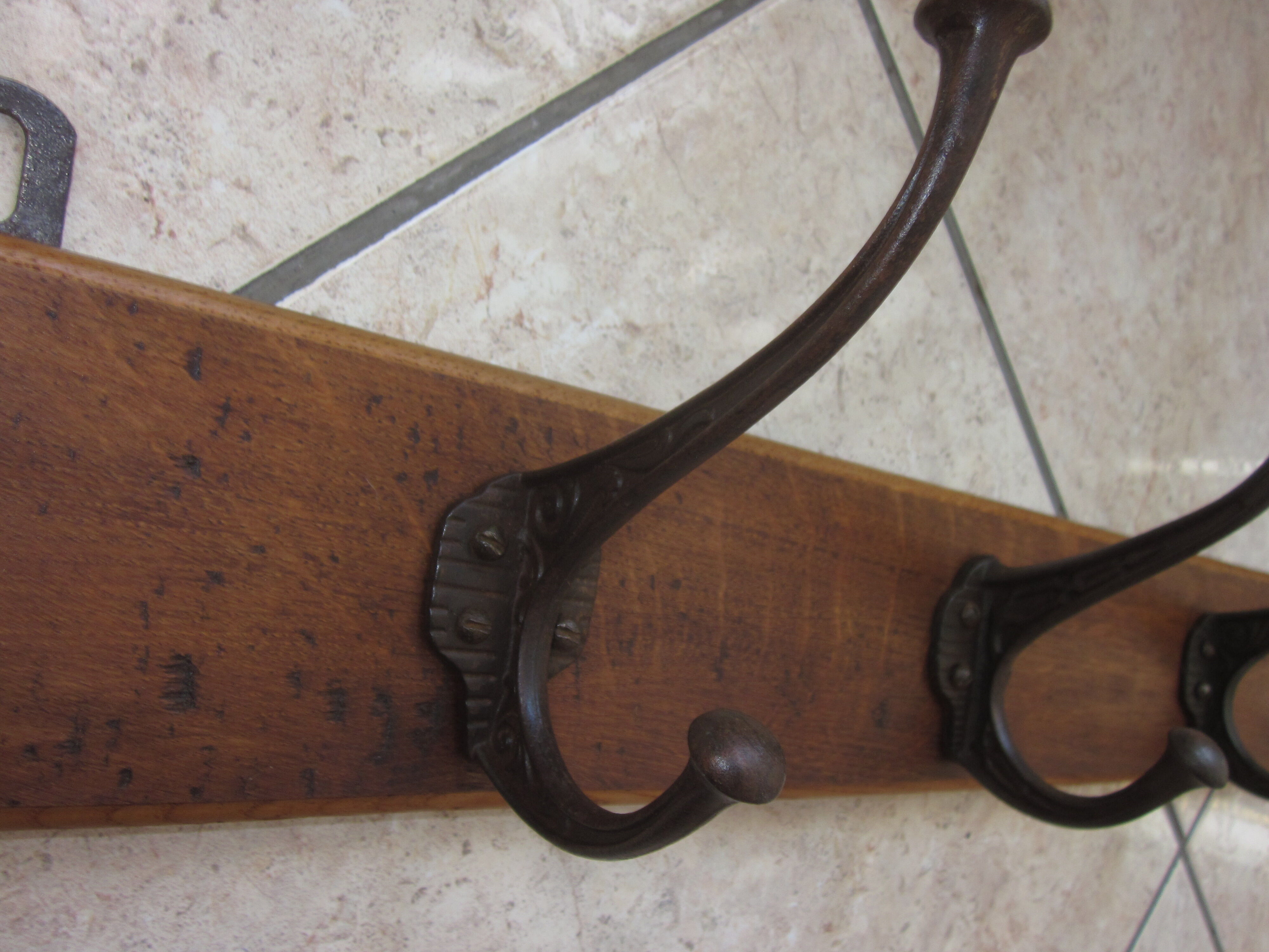 Bistro coat rack has 6 cast iron pads