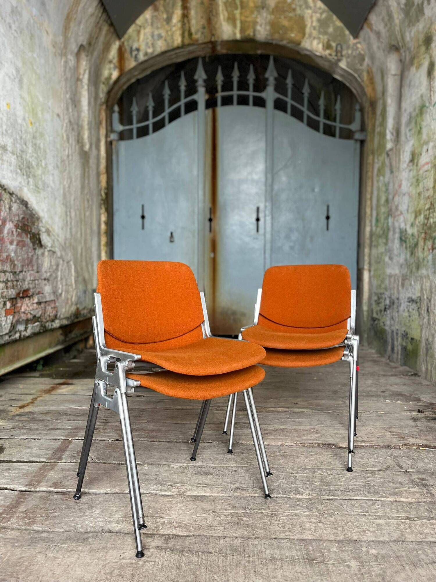 DSC 106 chair in orange by Giancarlo Piretti for Castelli, 1970s.