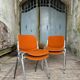DSC 106 chair in orange by Giancarlo Piretti for Castelli, 1970s.