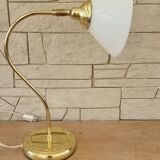 Articulated brass and opaline lamp.