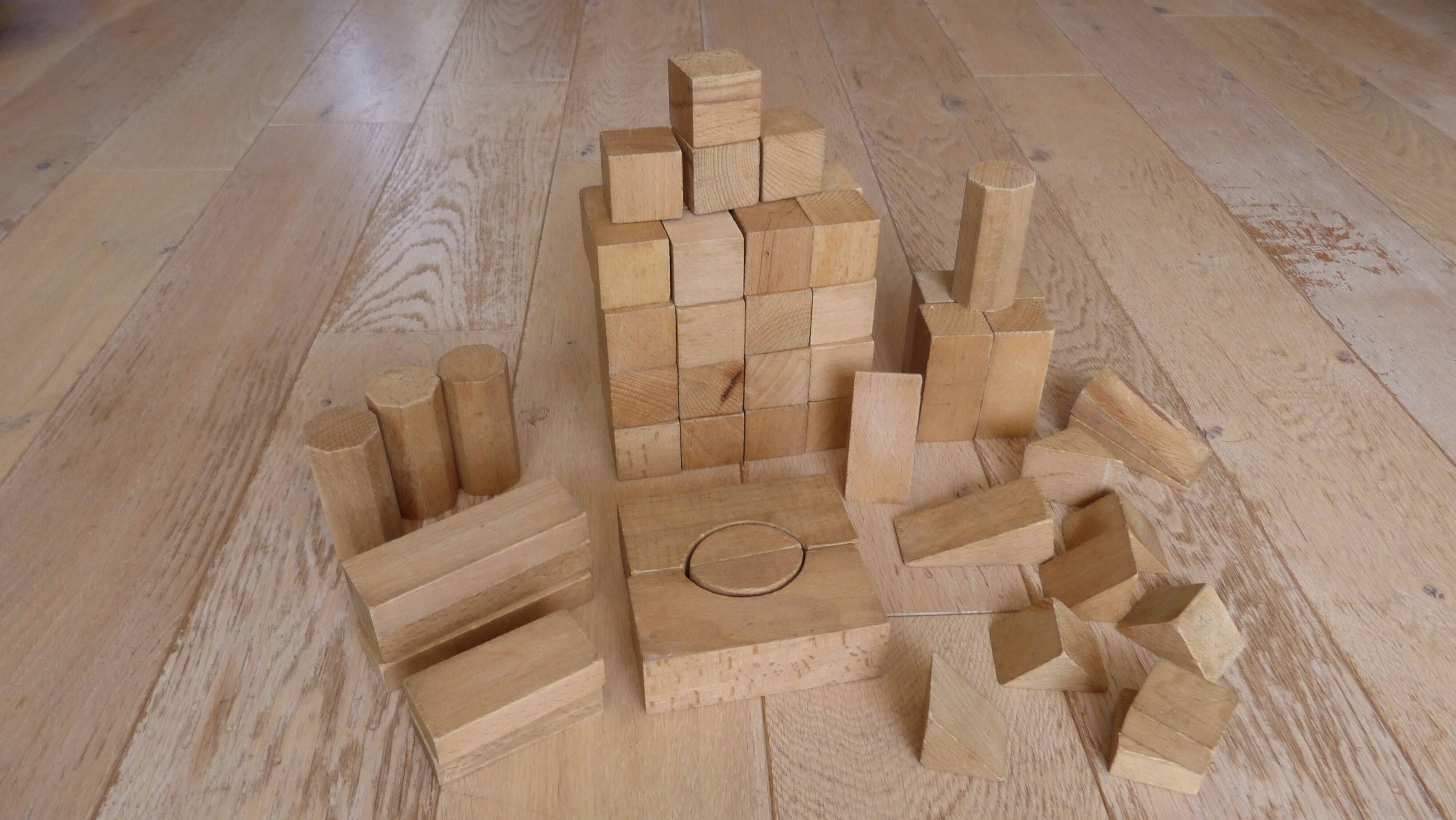 Old raw wood construction game in its cart