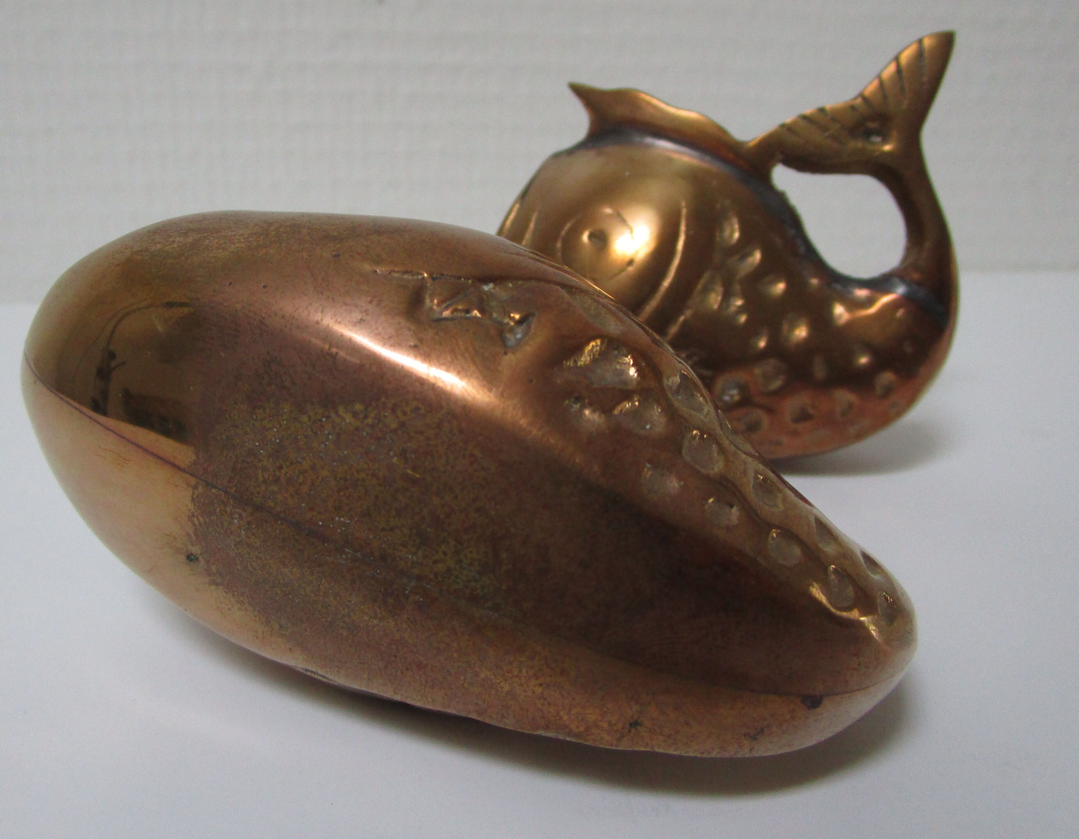 Two vintage brass fish ashtrays