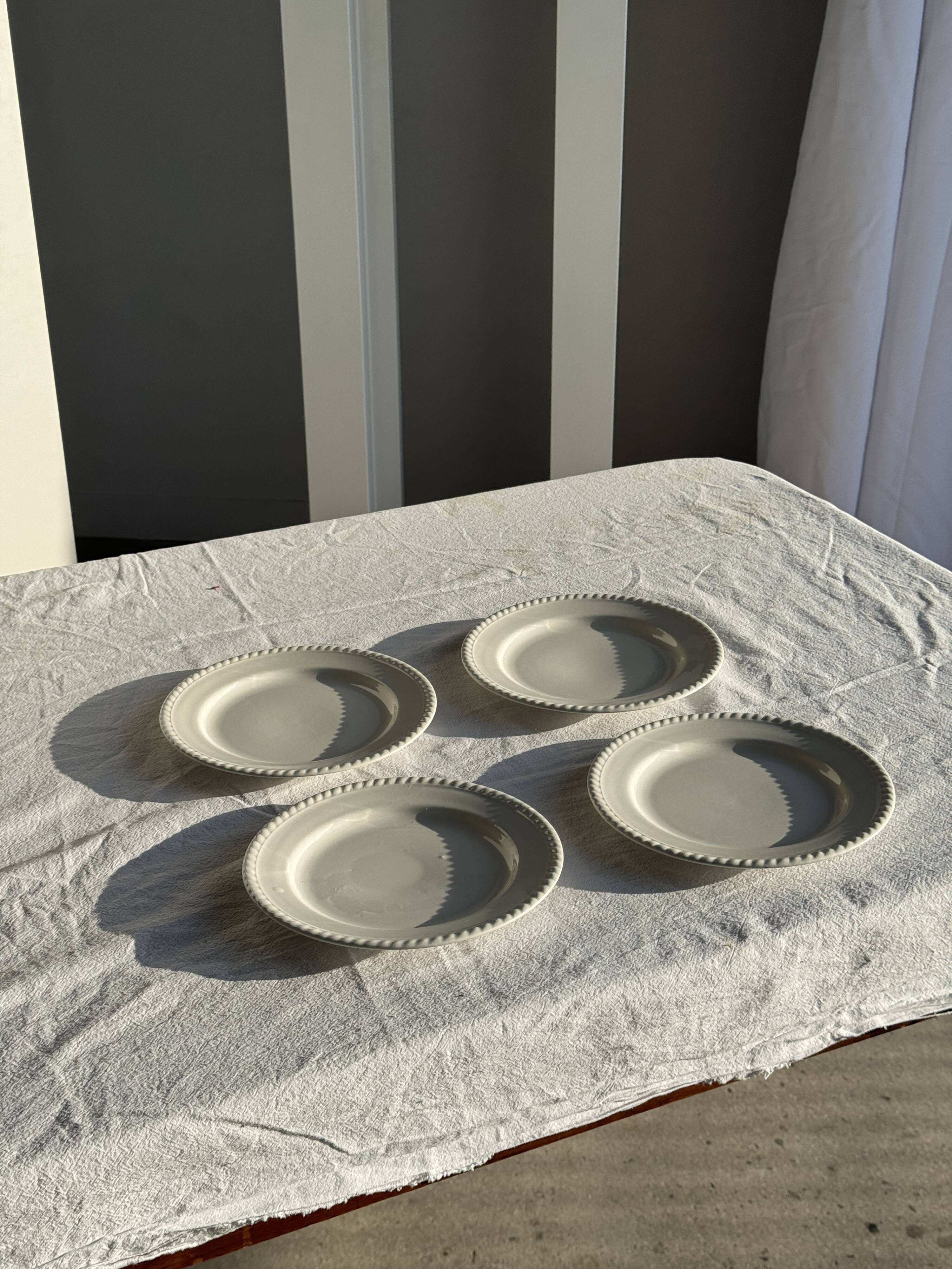 Set of 4 small white earthenware dessert plates D20