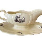 Antique sauce boat in Sarreguemines earthenware.