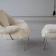Womb Chair and Ottoman in fluffy white fabric by Eero Saarinen