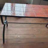 Wrought iron and orange ceramic coffee table