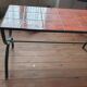 Table basse en fer forgé et céramique orange