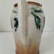 Moulded slip pitcher - late 19th century - Floral decoration in relief