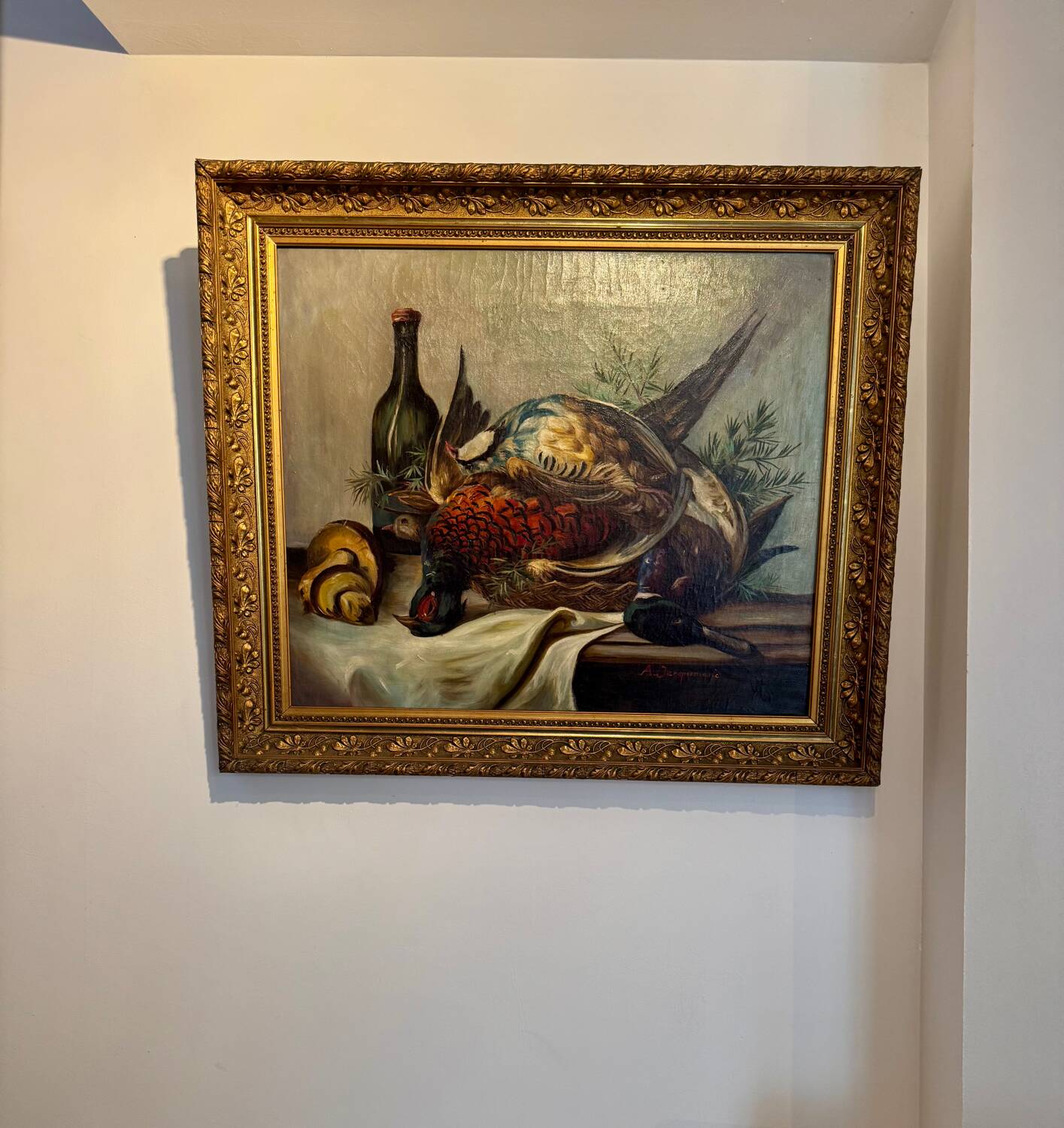 Still life with bottle and game, signed, 20th century