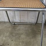 Pair of chrome and cane folding chairs