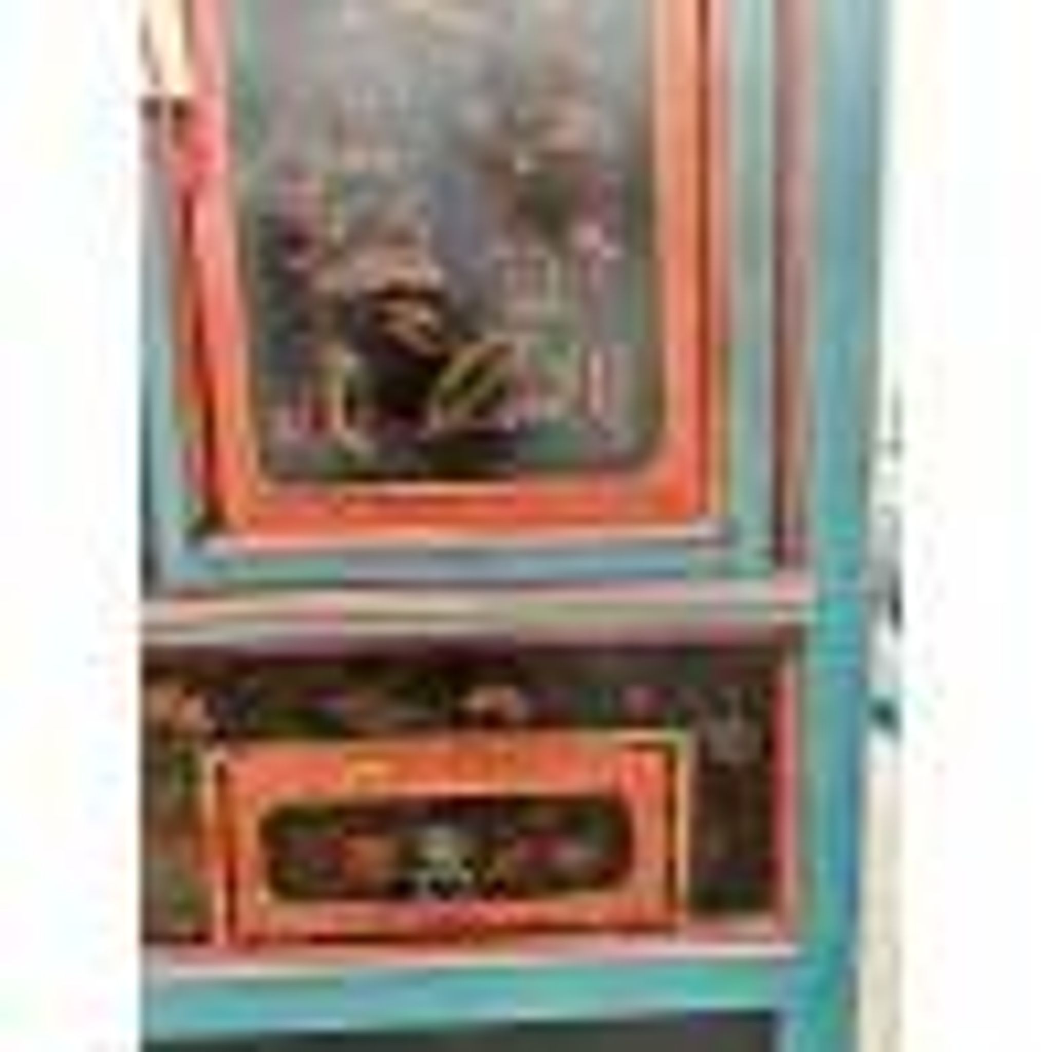 Restored antique Vietnamese wardrobe with care.