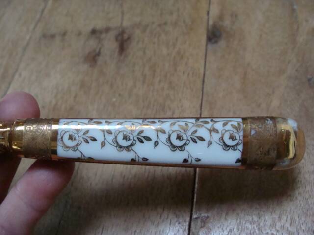 Art Deco silver and porcelain fruit ladle