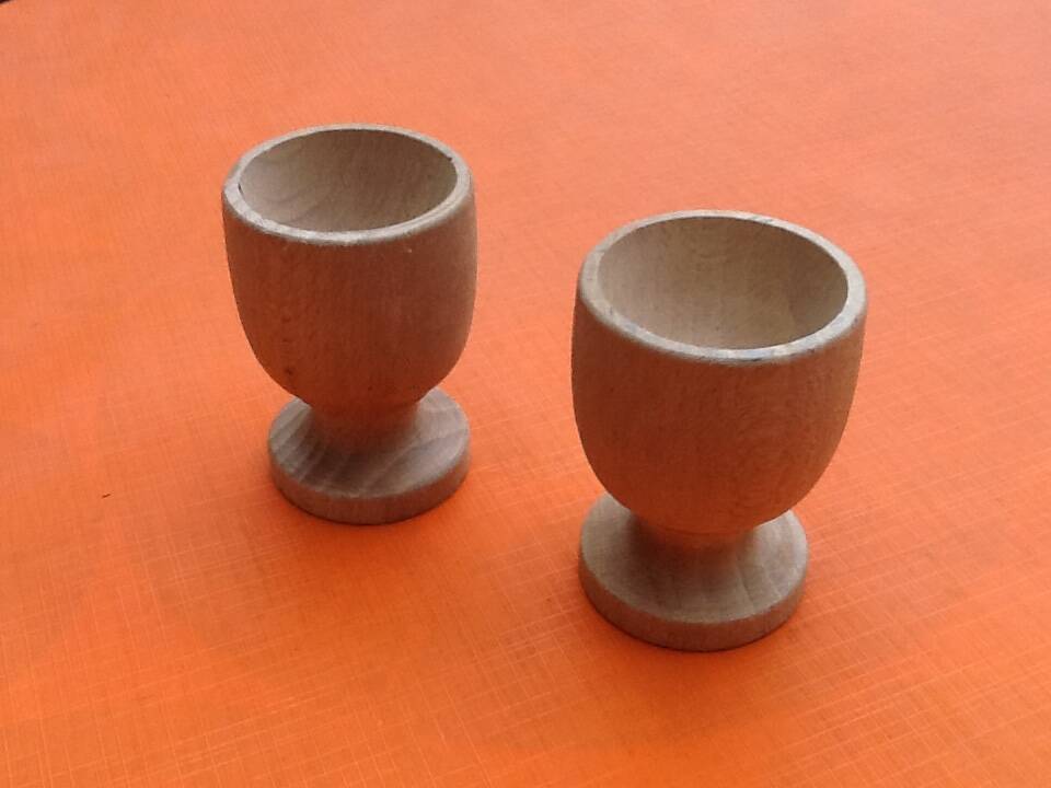 Two shells on foot shower turned wood raw finish