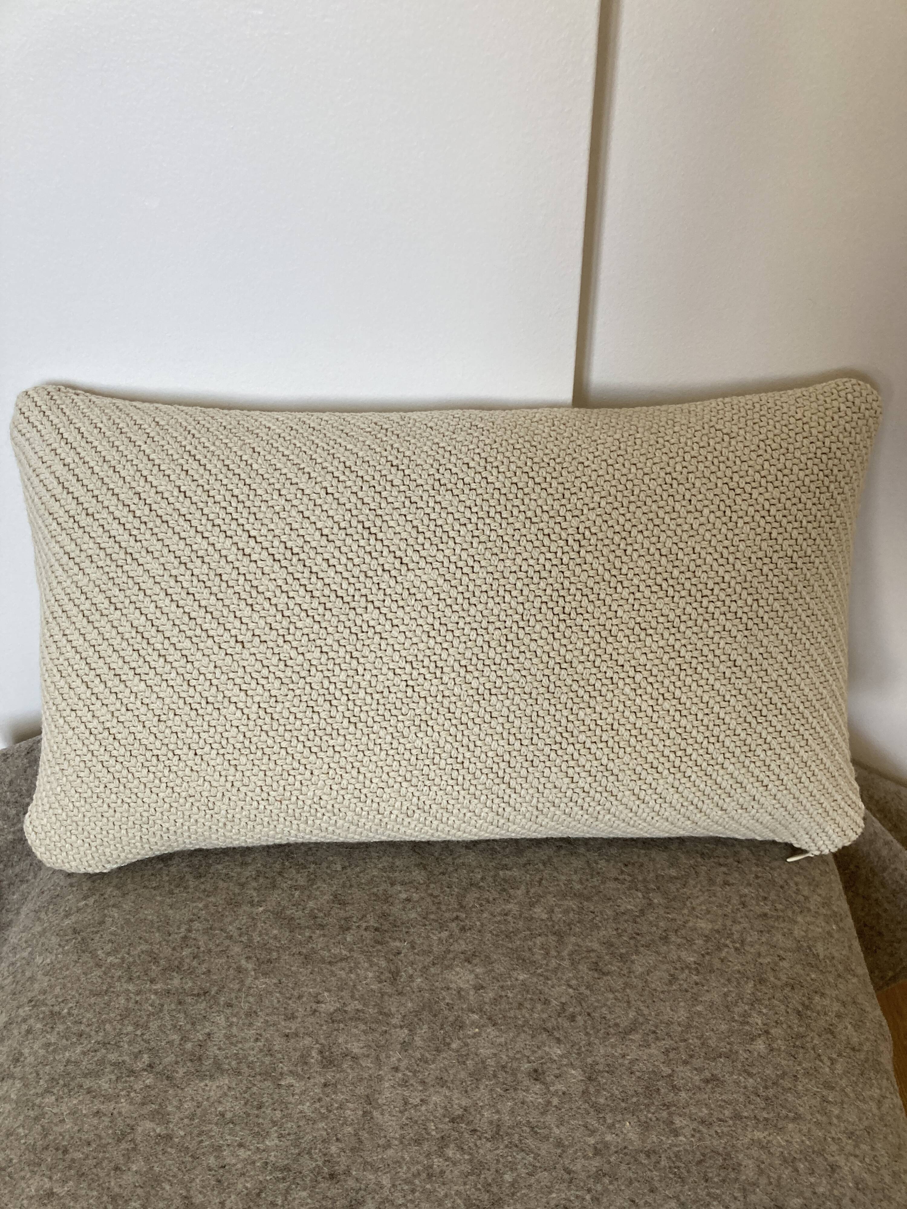 Beige ecru wool cushion