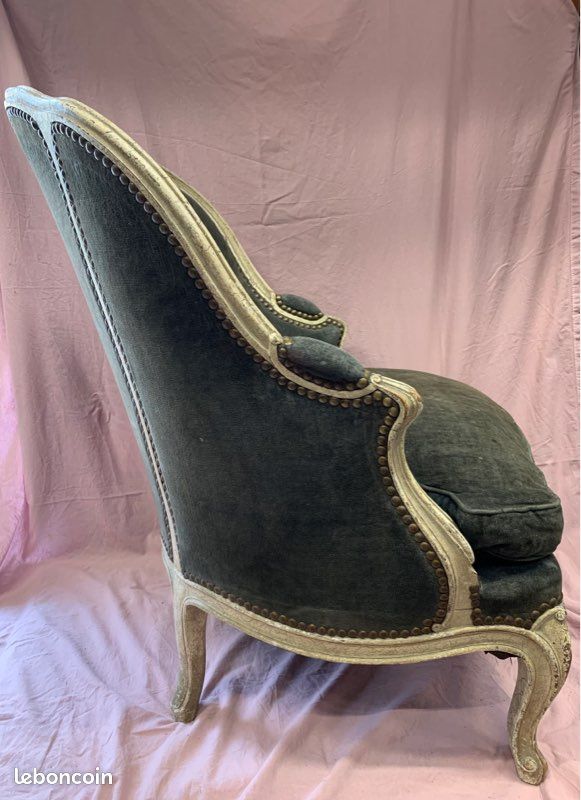 Green velvet shepherdess armchair