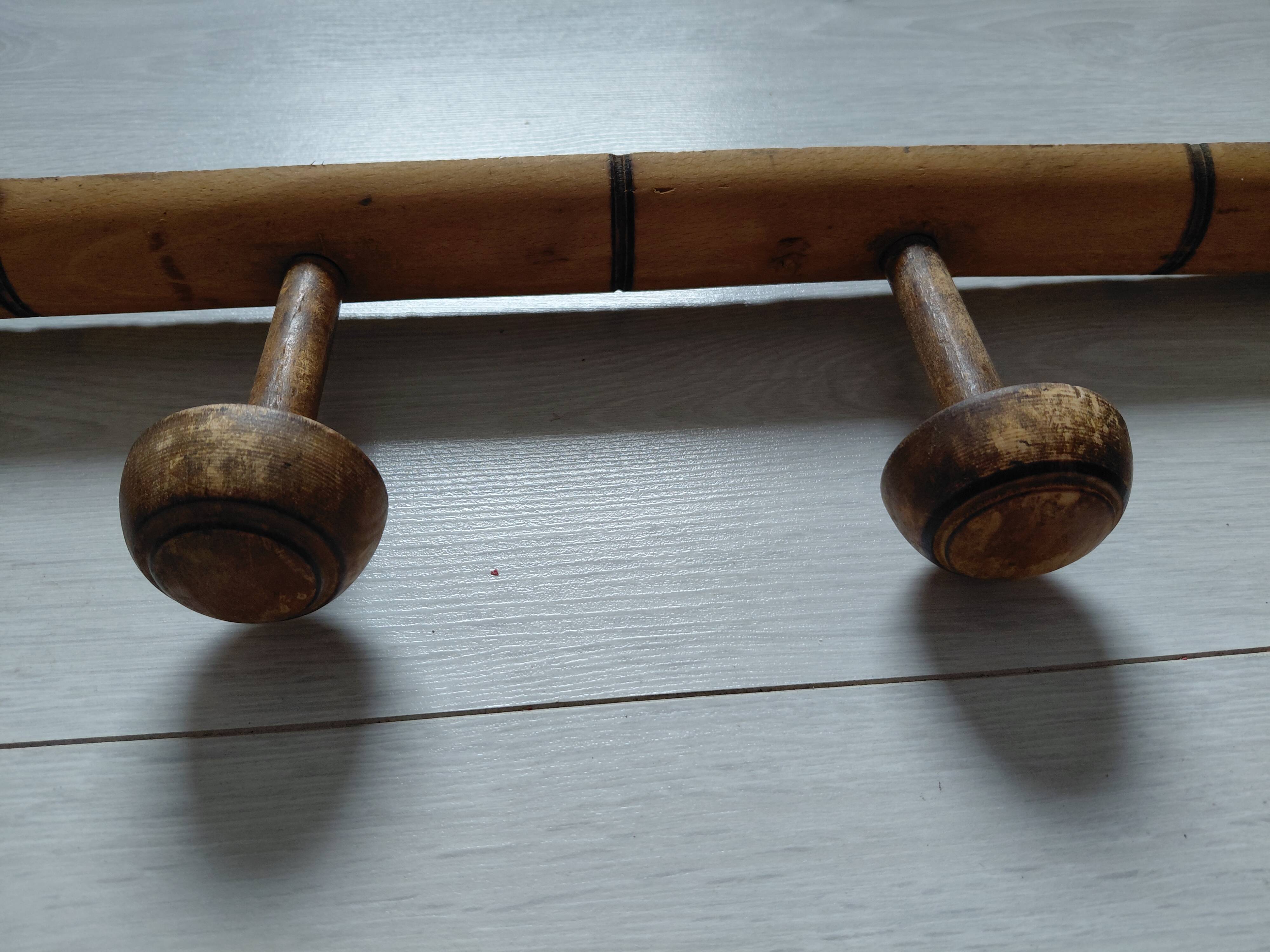 Wooden wall coat rack