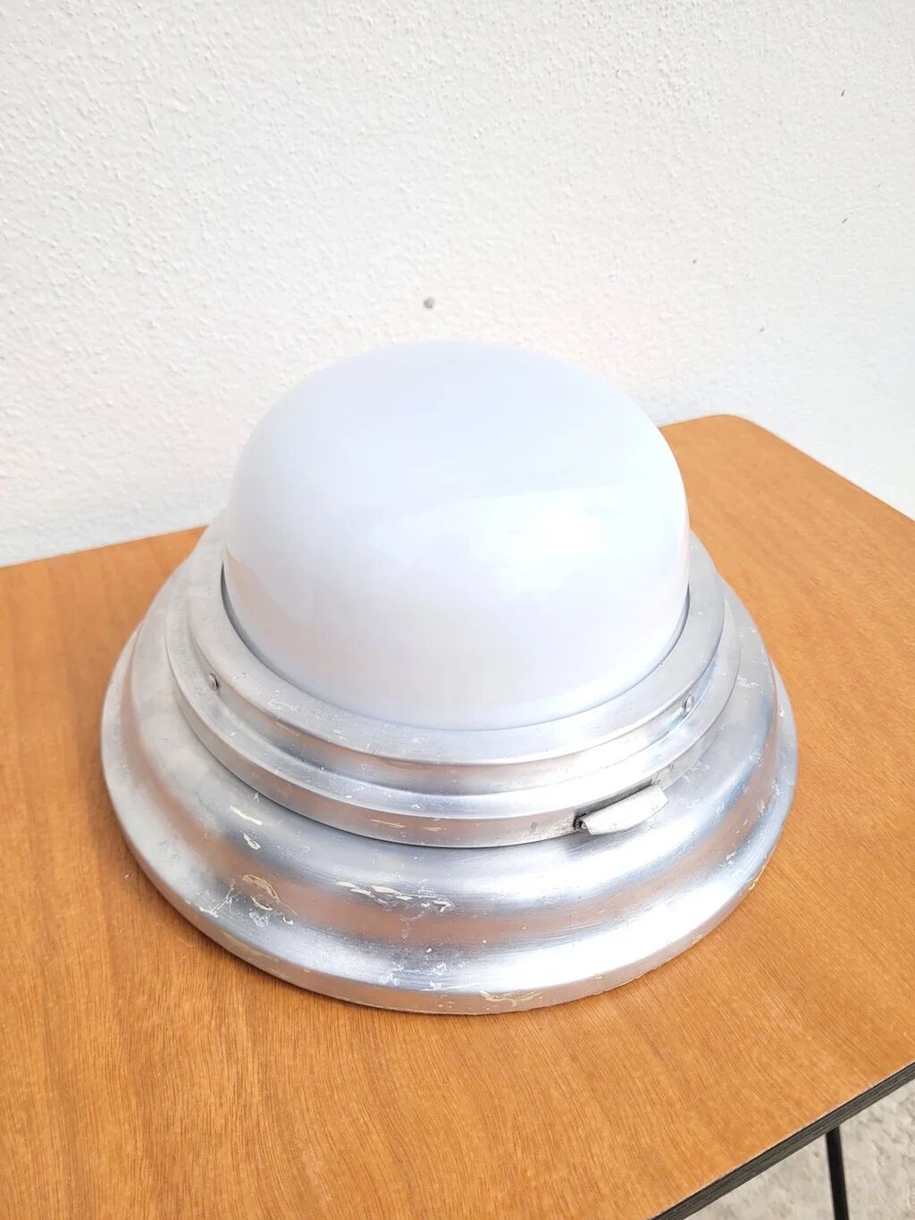 Vintage 1950s wall lamp porthole in aluminium and opal glass.