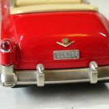 Red Cadillac 50s model car, made of metal, vintage from the 1970s
