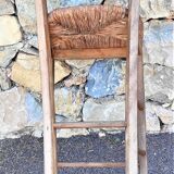 Chaise haute paillée de bar