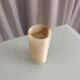 Small vintage cylindrical vase in onyx.