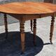 Extendable round table (with extensions and flaps), cherry wood.