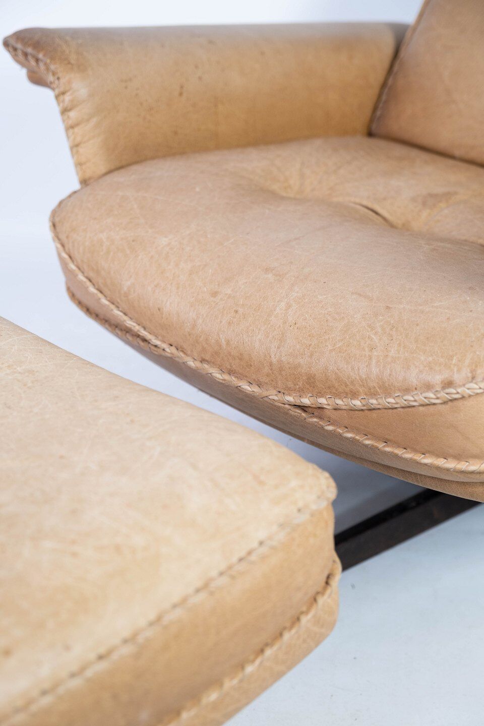 Armchair and stool in 1960s Danish leather and rosewood