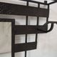Art Deco wrought iron coat rack with bevelled mirror.